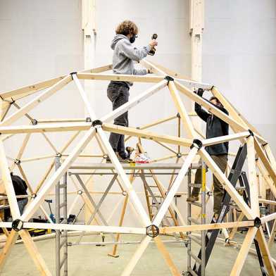wooden dome and a person