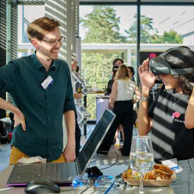 Participants have fun with the VR glasses.