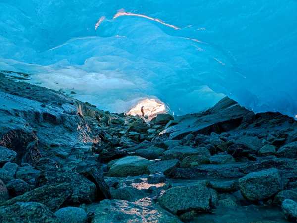 person under a glacier