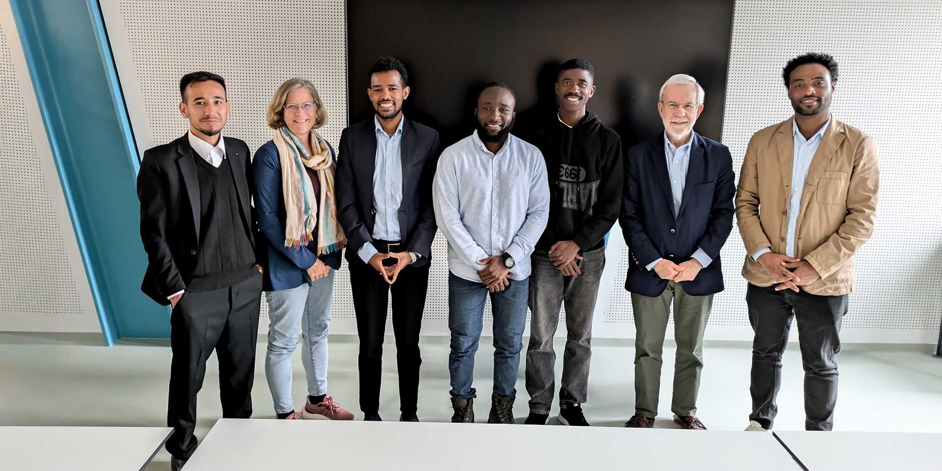 Group photo of students and professor