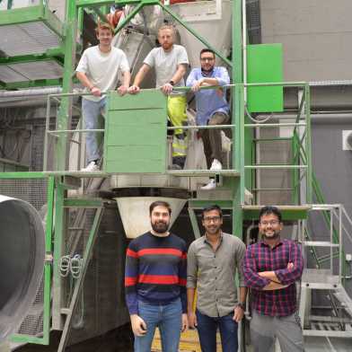 Team of people in a concrete factory